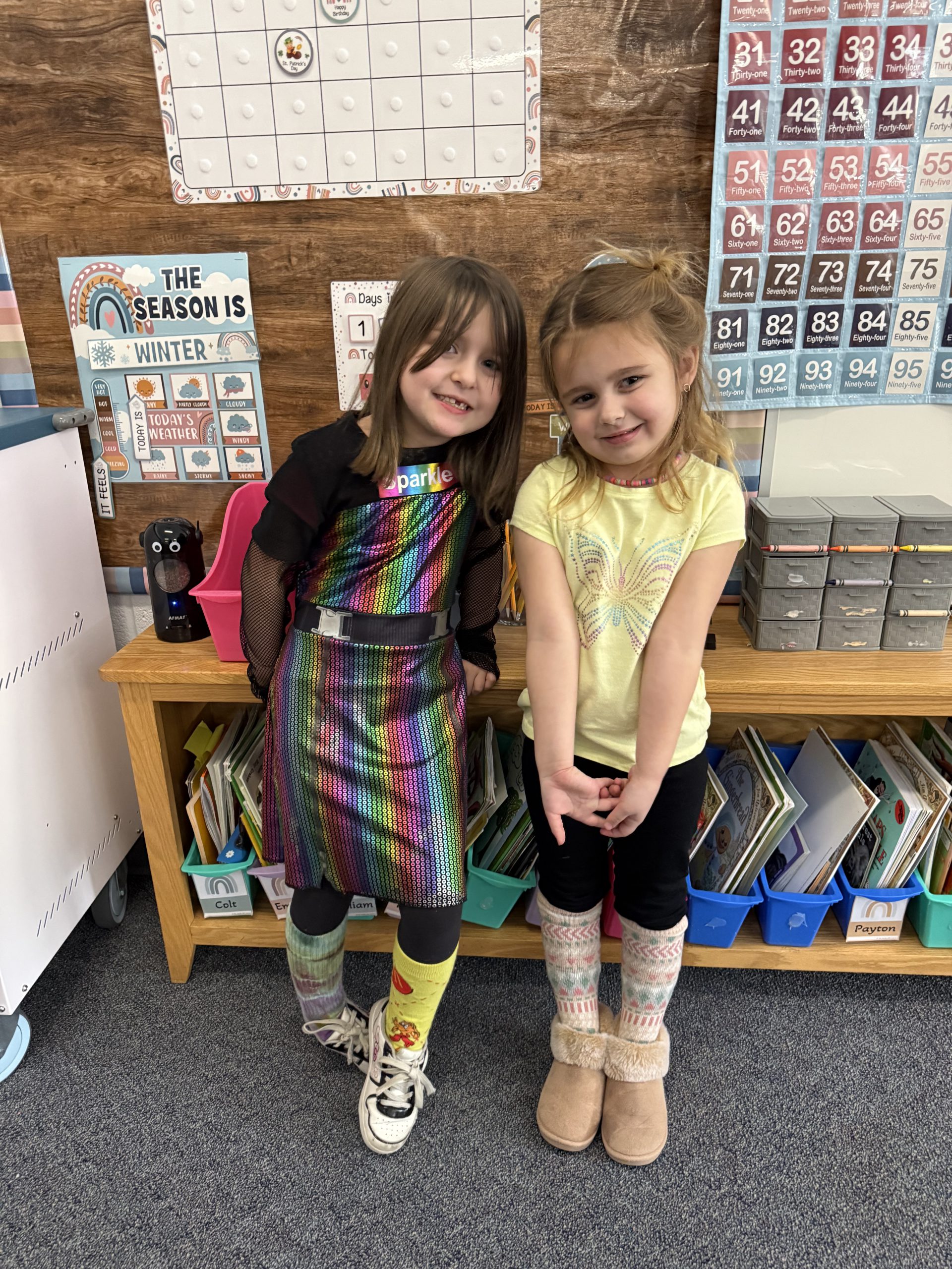 Two young female students smiling