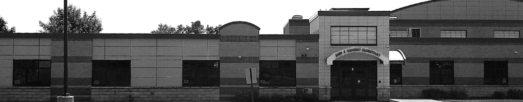 JFK Elementary School exterior image in black and white