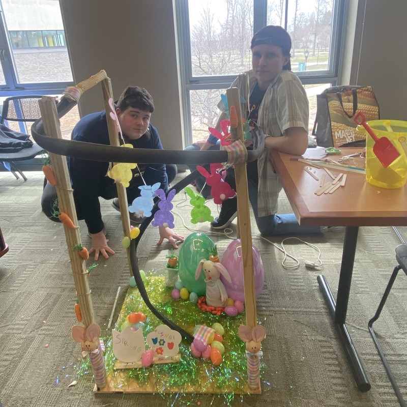 Lily Starts and Bryan Lust with their roller coaster model
