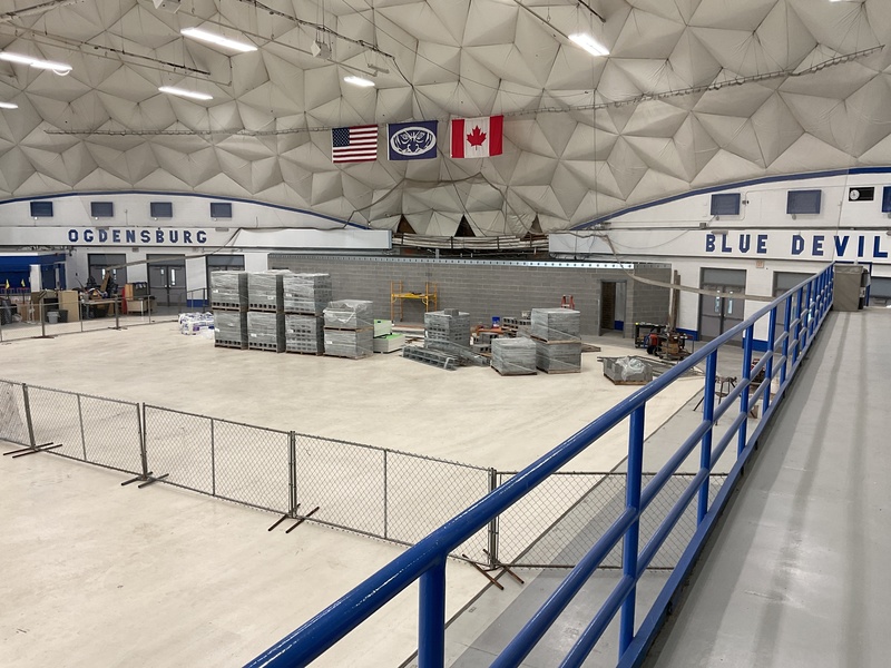 Dome interior with construction supplies.