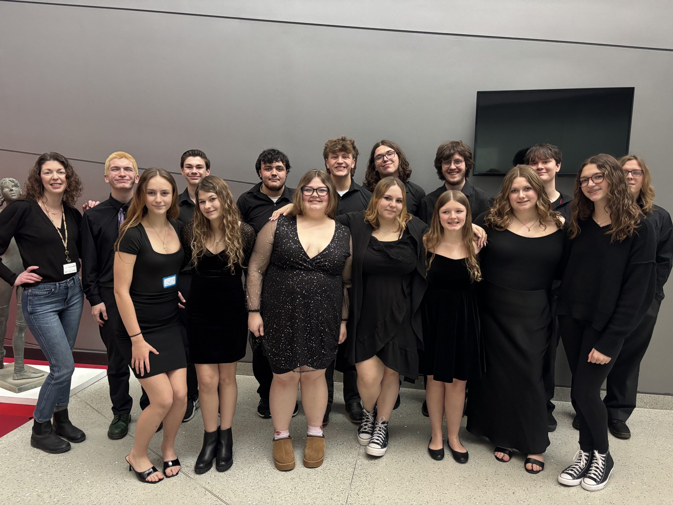 Large group of teenage students smiling