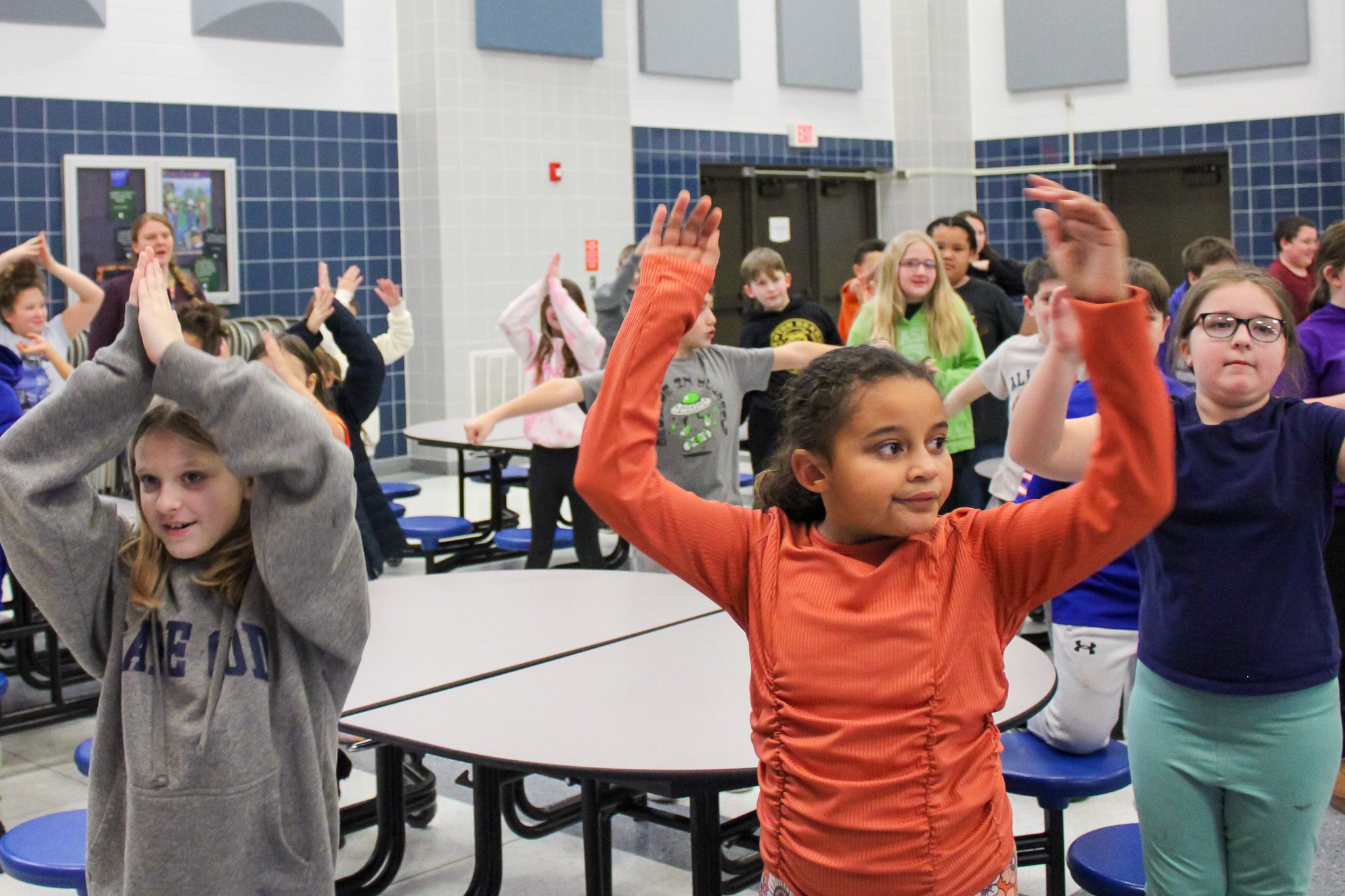 Large group of elementary students participating in physical activity