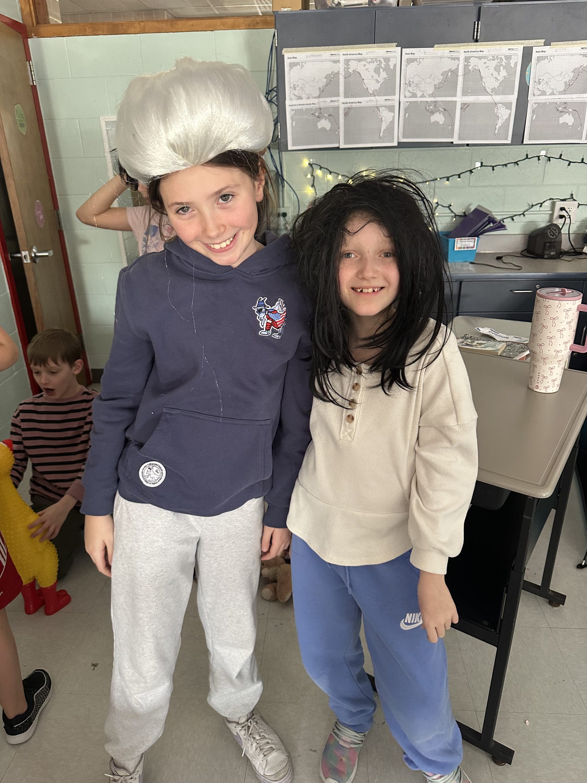 Two young elementary students in costume