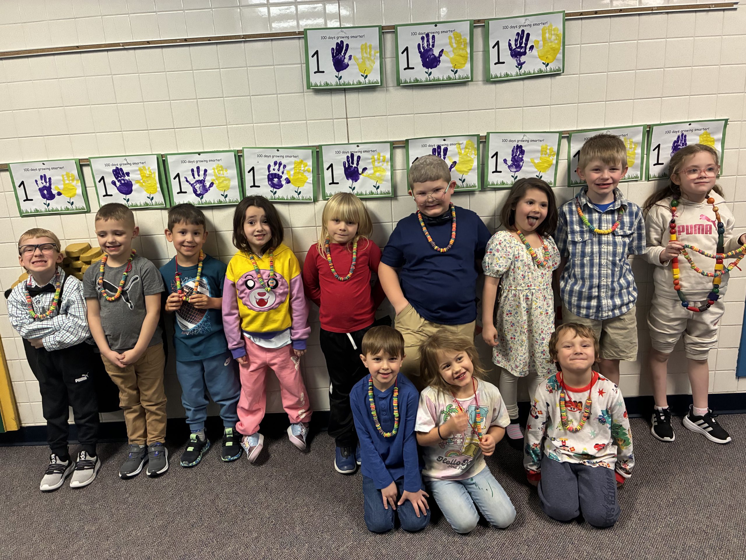 Small group of elementary students smiling