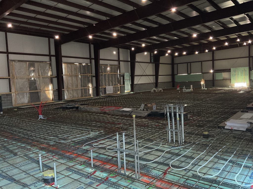 Building interior with tubing on the floor